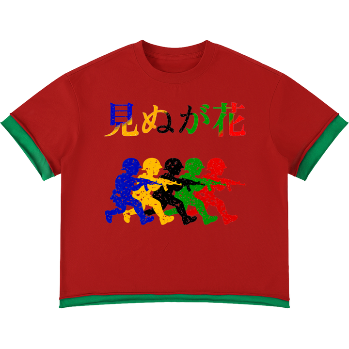 Red oversized Japanese graphic boxy t-shirt with green trim and multicolor anime-inspired front artwork.