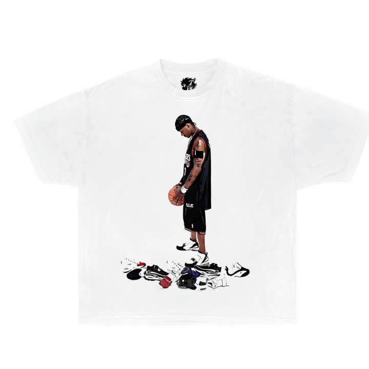 White t-shirt with a graphic of a person holding a basketball and various shoes on a white background. Allen Iverson Vintage oversized boxy shirt looking down at nike shoes.