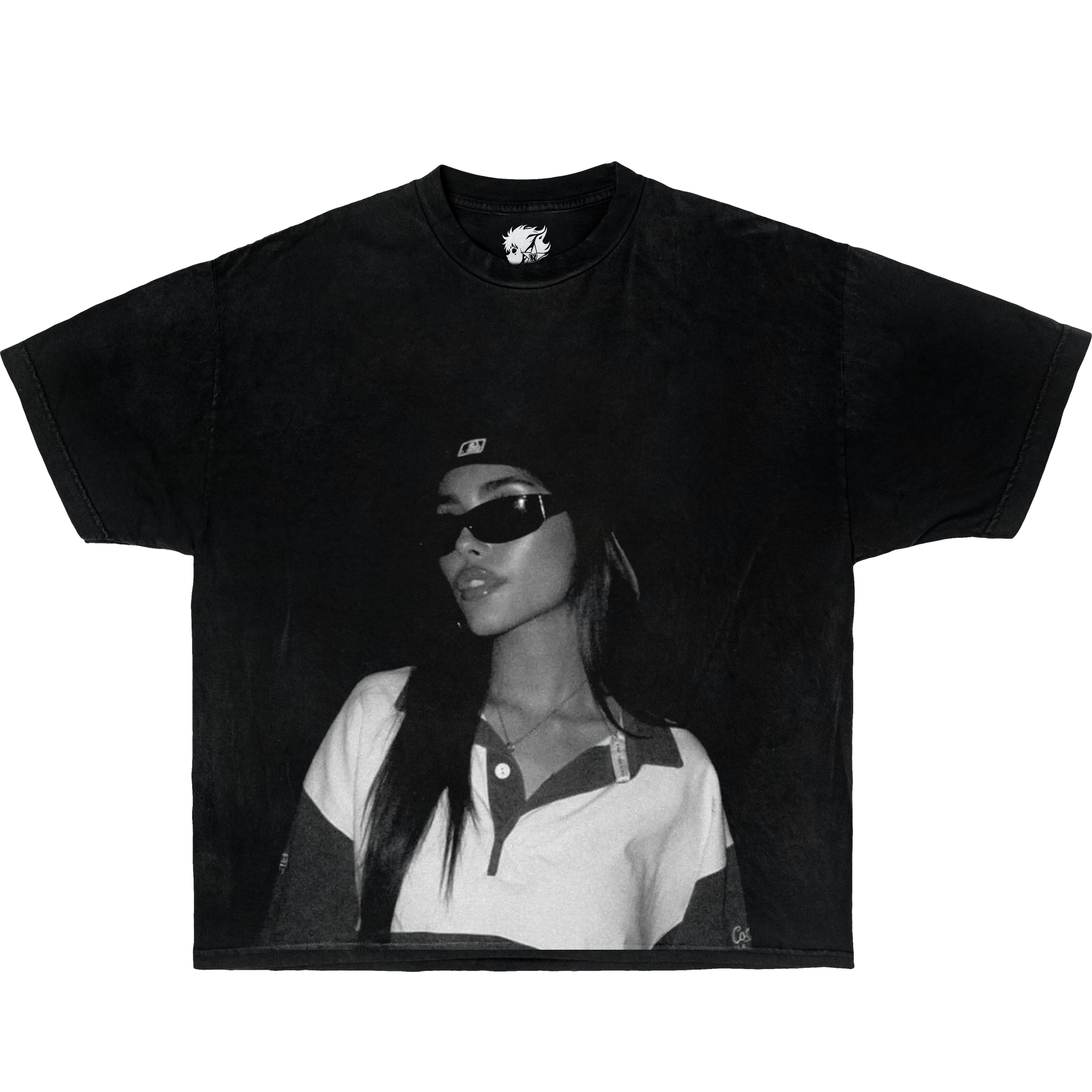 Black t-shirt with a printed design of a person wearing sunglasses and a cap on a white background. Madison Beer Vintage Oversized Boxy Shirt