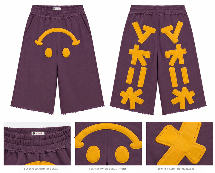 Purple shorts with yellow leather patch appliques, shown from the front and back with close-up detail panels at the bottom.