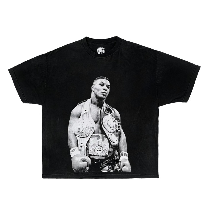 Black t-shirt with a graphic of a boxer holding championship belts on a white background. mike tyson shirt