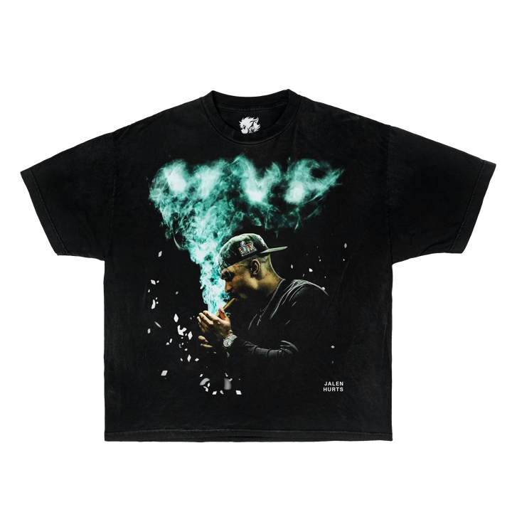 Black t-shirt with a graphic of Jalen Hurts smoking and green smoke on a white background. Jalen Hurt Shirts
