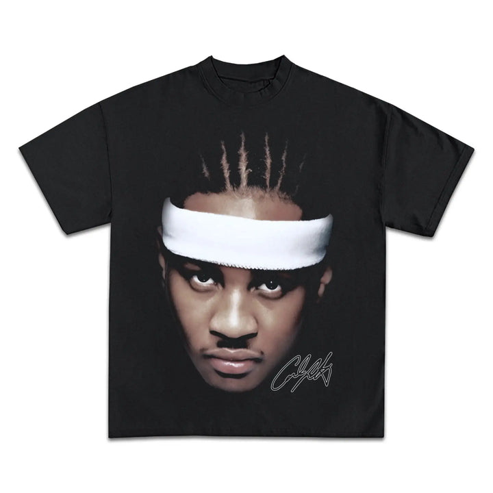Black t-shirt with a graphic of a person wearing a headband on a white background. carmelo anthony vintage shirt