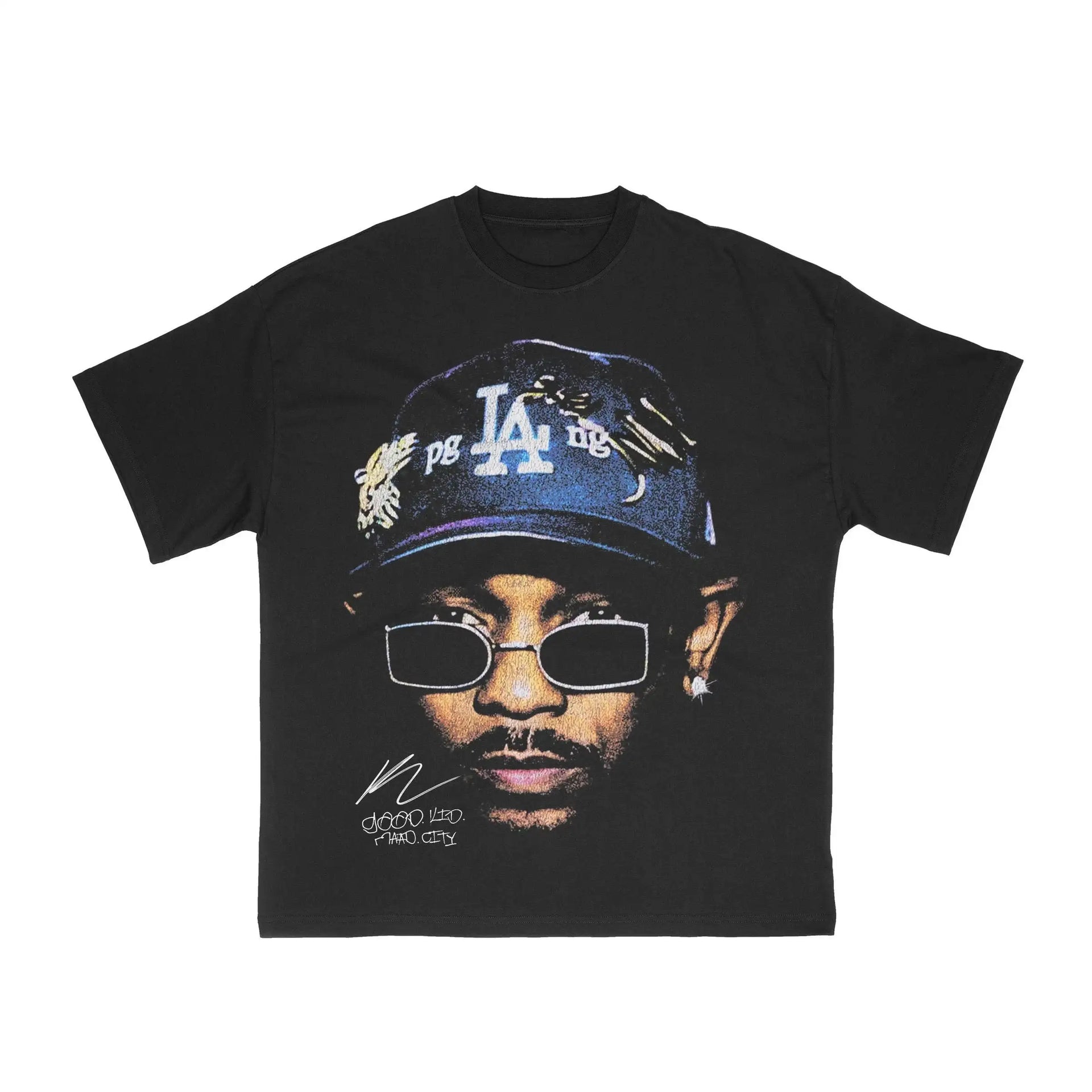 Black t-shirt with a graphic of a person wearing a cap and sunglasses on a white background. kendrick lamar shirt