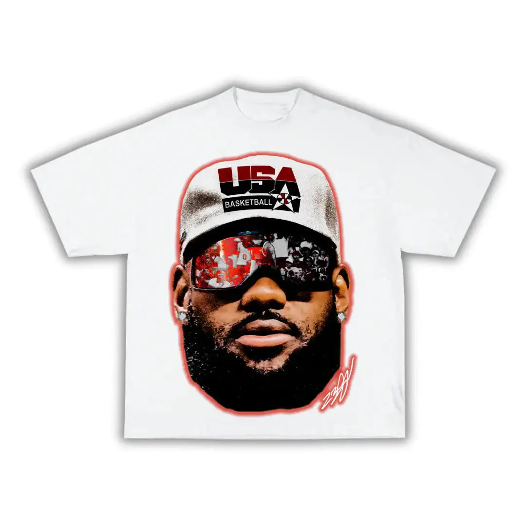 White t-shirt with a graphic of a person wearing sunglasses and a cap on a white background. lebron james