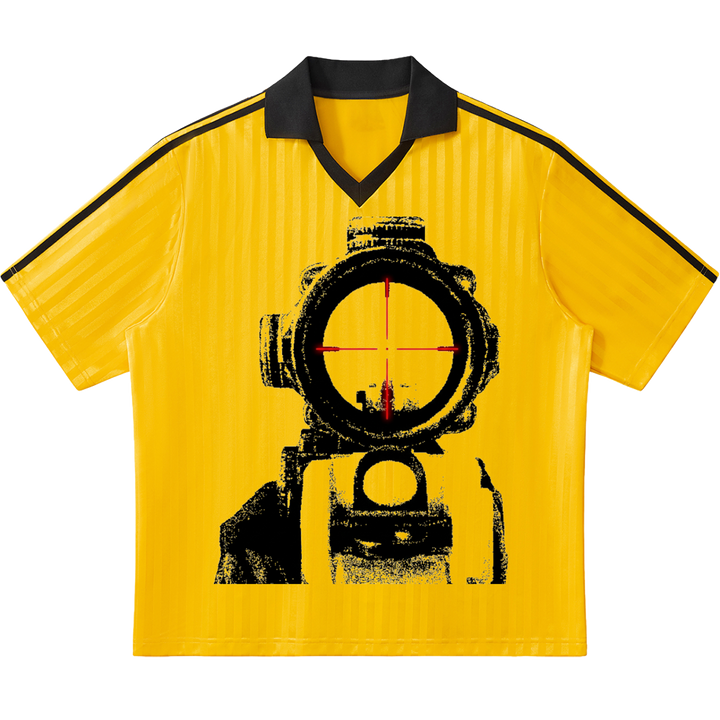 Yellow shirt with black target design on a white background